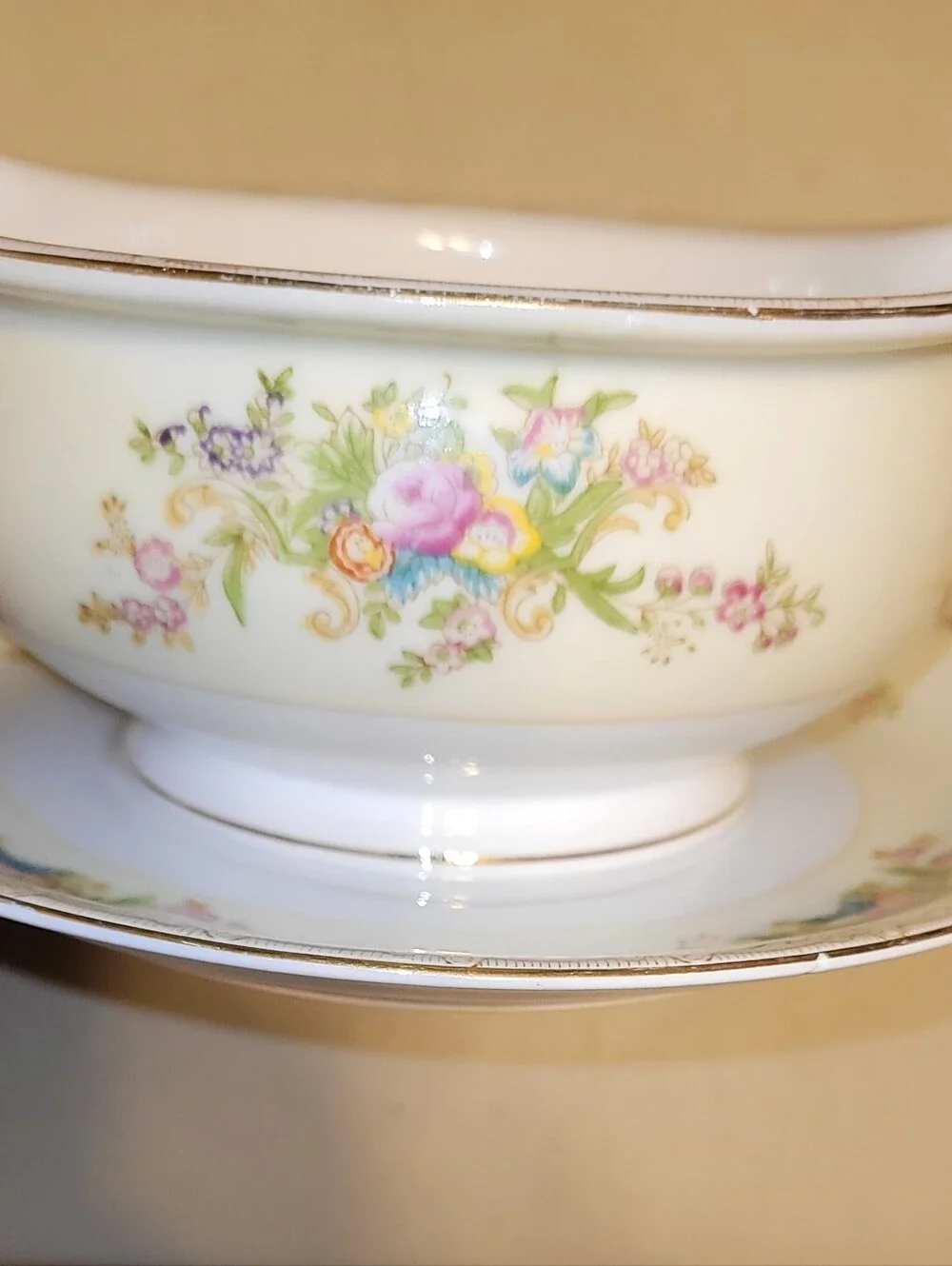 Mieto Porcelain Hand Painted Gravy Boat with Attached Saucer.